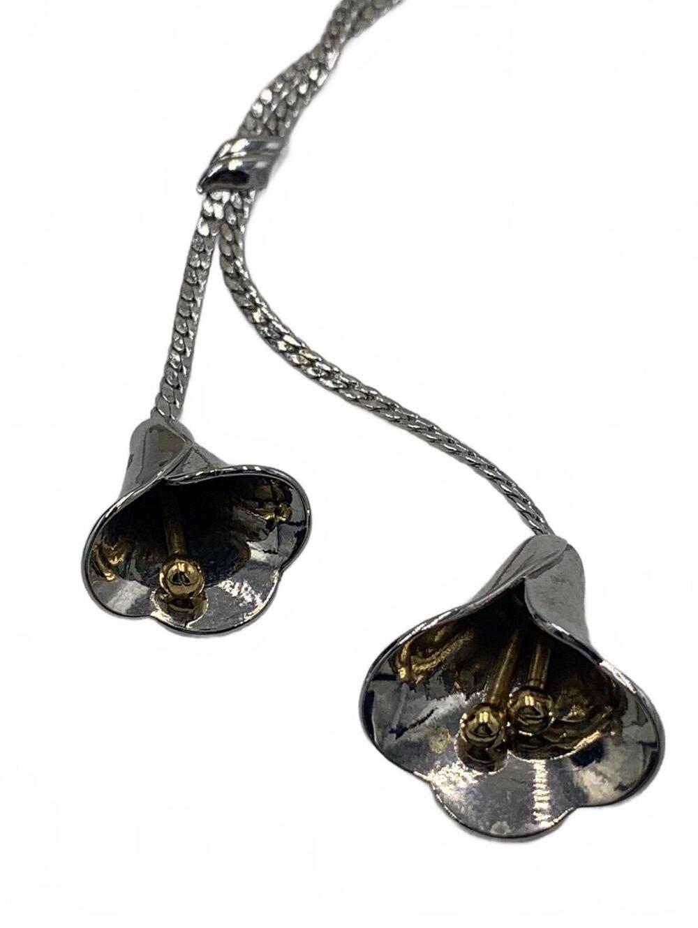 Avon Silvertone Floral/Lily Articulated Lily Chime Necklace